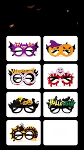Détail de montures de lunettes d'Halloween avec décorations en feutrine de citrouille et chauve-souris