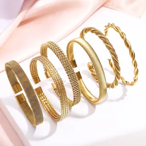 Luxury woven titanium steel bangle set with gold plating in minimalist open design
