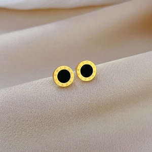 Minimalist gold titanium steel stud earrings with black center and Roman numerals
