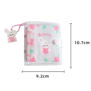 Detailed view of clear 3-ring binder photo album with pink bunny and size 10.7x9.2cm
