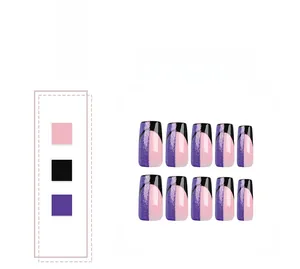 Detailed view of square faux nails featuring black, pink, and glitter purple patchwork design