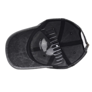 Internal view of a washed grey cotton baseball cap with structured panels and metal buckle