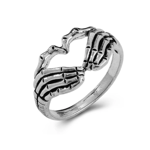 Gothic vintage skull hand heart ring in antique silver finish with detailed oxidation