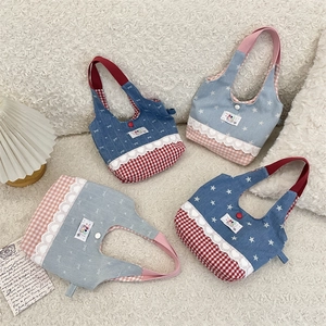 Flat lay of small patchwork tote bags with blue denim, red plaid, and white lace trim