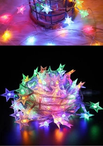 Detailed macro view of colorful star-shaped LED fairy lights for Christmas decor
