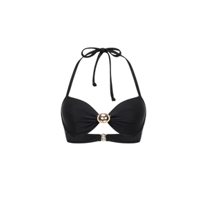Detail of black halter bikini top featuring a golden metal logo buckle and ties