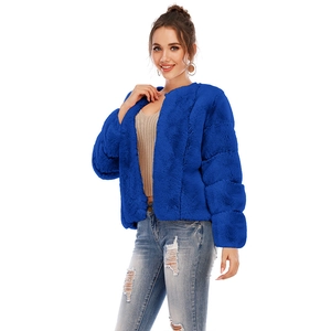 Detail of royal blue faux fur cropped coat with a round neck and soft texture finish
