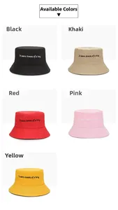 Five assorted colors of cotton bucket hats featuring premium white dream trip embroidery