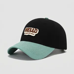Detail of children's cotton baseball cap with HELLO happiness embroidery patch