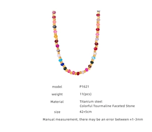 Detail of colorful tourmaline bead necklace with titanium steel gold spacer beads