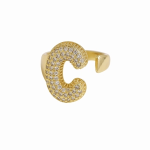 Close-up of 18k gold plated adjustable ring with zircon-studded bubble letter C