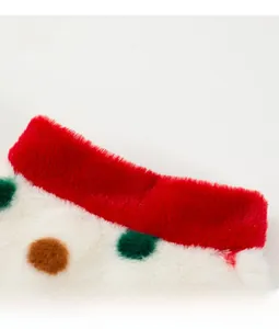 Close-up of soft plush collar and polka dot pattern on warm dog winter apparel