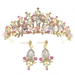 Detail of gold leaf bridal tiara and earrings with crystal and pink bead accents