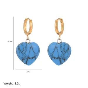 Detail of blue turquoise heart earrings with golden hoops, 3.7cm x 2cm, 8.2g weight