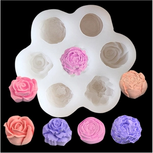 Detailed 7-cavity silicone mold for rose-shaped candles and soaps with floral samples