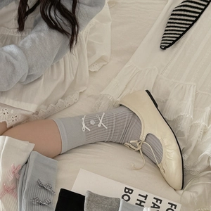Ballet-style knit mid-calf socks with ribbons and 3D bows in various soft colors