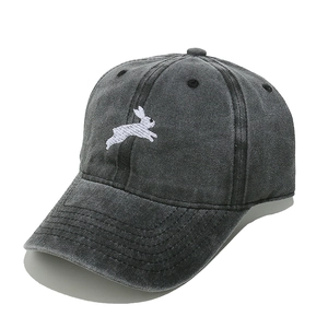 Vintage washed charcoal cotton baseball cap with white rabbit embroidery and curved brim