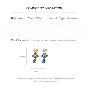 Detailed size and material information for blue rhinestone vintage earrings