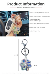 Macro detail of crystal snowflake keychain showing 4cm flower and 12cm total length
