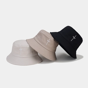 Three peace embroidery bucket hats in beige, tan, and black colors for outdoor wear