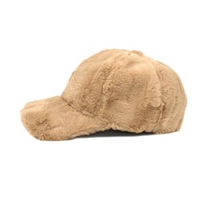 Detailed side view of the warm plush faux fur texture on a khaki winter baseball cap