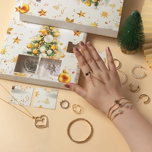 2025 Christmas advent calendar jewelry gift box with gold necklaces and earrings