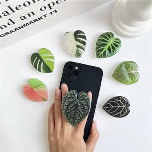 Detail showing various heart-shaped leaf textured acrylic phone sockets and grips