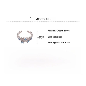 Detail of silver-toned open ring with five blue zircons in a jagged geometric design