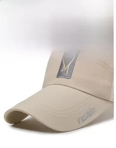 Detail of breathable mesh fabric on a beige baseball cap with fashion embroidery