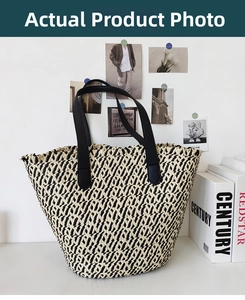 Detail of large woven paper straw tote bag with black and white chevron pattern and PU handles