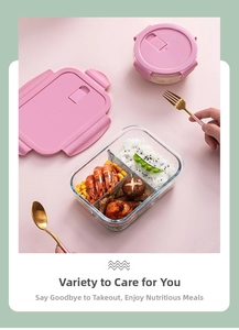 Pink lid glass bento box with sections for rice and shrimp on a warm aesthetic setting