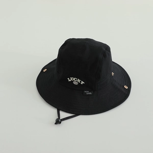 Detail of black kids sun hat with Lucky embroidery and adjustable windproof rope