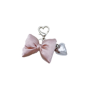 Champagne pink bow keychain with silver heart pendant and metal clasp for bags