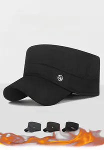 Close-up of thick winter military flat top cap featuring metal SP badge and warm fabric