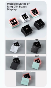 Detail view of marble and minimalist jewelry boxes with sponge inserts for rings and earrings