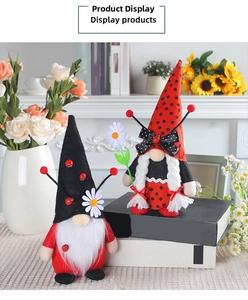 Macro detail of ladybug gnome plush set with daisy accents and floral decor background