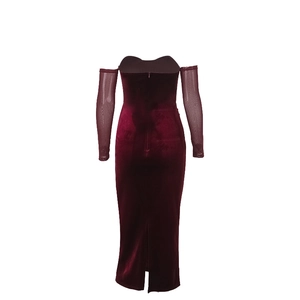 Detail view of burgundy velvet dress showing back invisible zipper and mesh sleeves