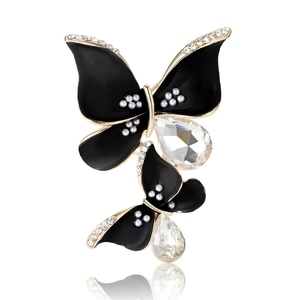 Elegant gold-edged black enamel butterfly brooch with pearls and teardrop crystals