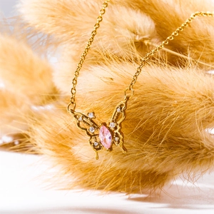 Exquisite gold butterfly necklace with pink marquise gemstone and white crystals