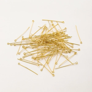 18K gold plated eye pins for jewelry making shown on a clean white background