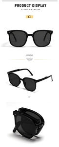Detail of glossy black foldable sunglasses with grey lenses in various viewing angles