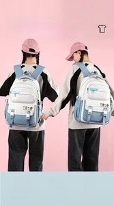 Detail of waterproof casual backpack showing 15.6 inch laptop storage and padded straps