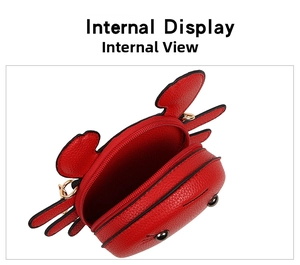 Internal view of a red crab-shaped coin purse showing spacious storage and dual gold zippers