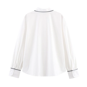 Back view of minimalist white long sleeve poplin shirt with black contrast trim detail