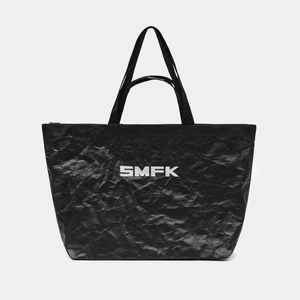 SMFK black foldable gym bag with white logo, durable crinkled fabric and top handles