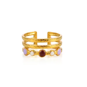 Detailed view of 18k gold plated triple-layer adjustable ring with colorful enamel inlay