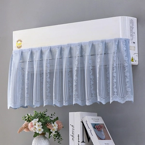 Detail of light blue lace air conditioner dust cover with floral mesh pleats and trim