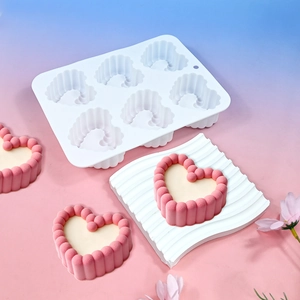 6-cavity heart silicone mold with wavy edges for mousse cakes and chocolates