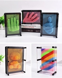 Detailed views of 3D pin art toys in various colors showing handprints and shapes