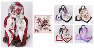 Macro view of floral print satin scarf patterns in various vibrant color combinations
